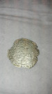 Poškozená stříbrná mince