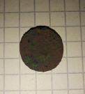 Postříbřená mince s kosočtvercem