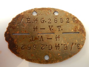 Známky nalezené detektorem kovů Tejon