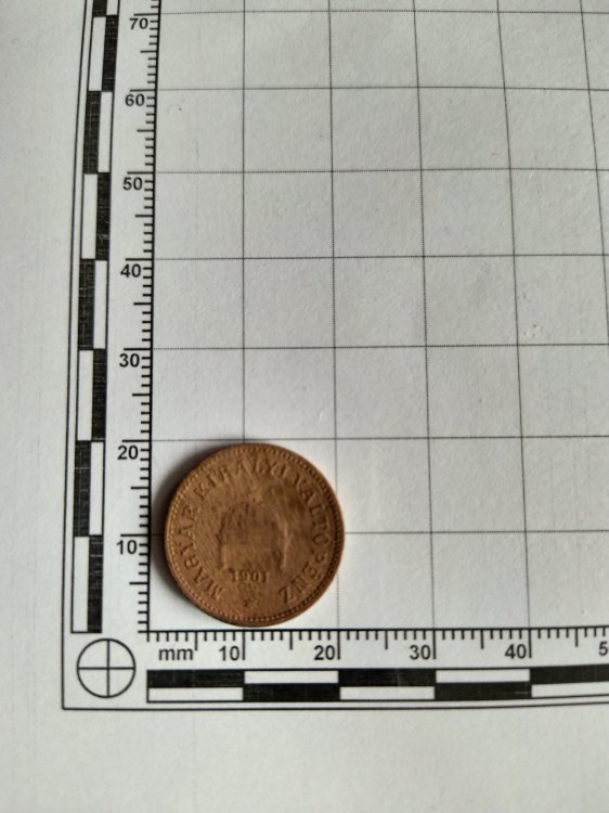 Zadní strana mince po očištění