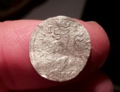 Jednostranná mince se lvem asi 1710