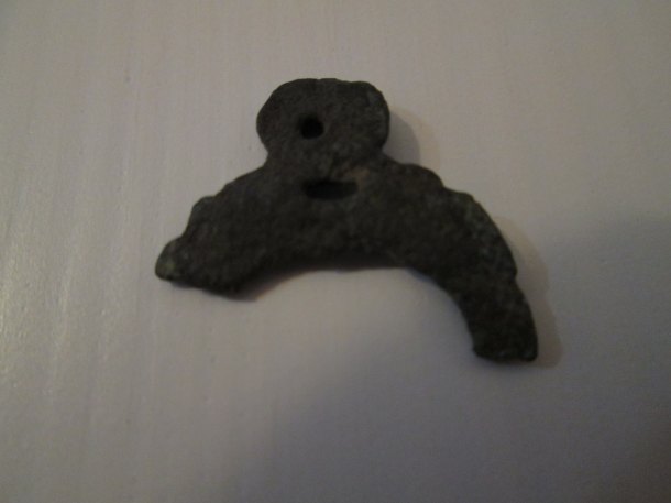 Torzo laténského amuletu.