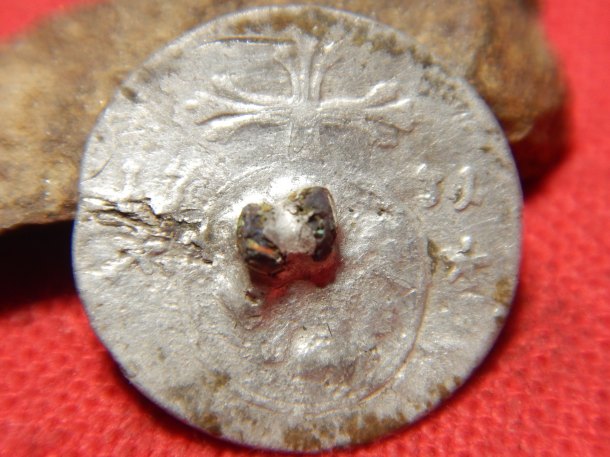 Knoflík z mince