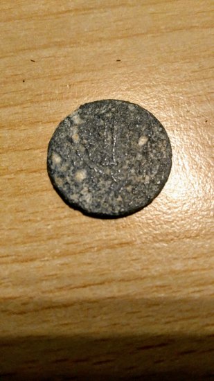 První z mincí 10leteho hledače