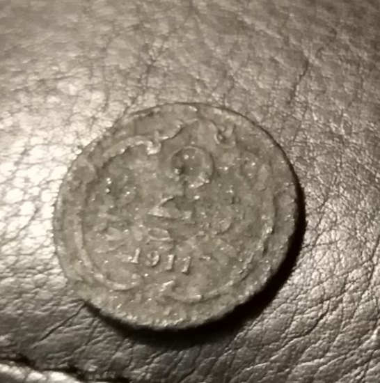 První mince
