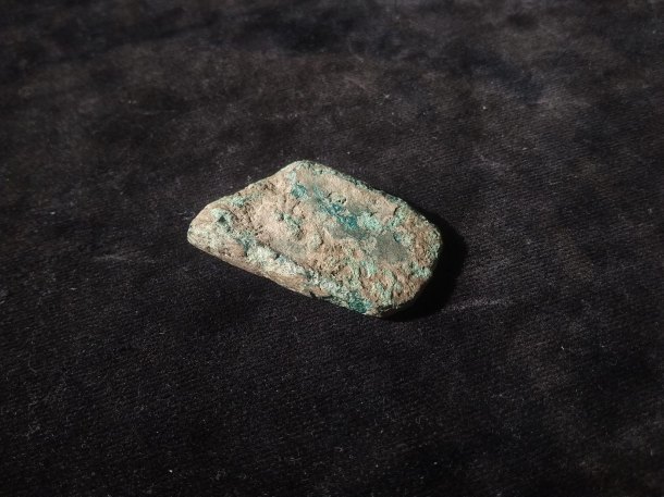 Fragment bronzové sekery