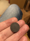První mince