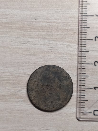 Nevie niekto približne čo to je za mincu podľa tvaru a veľkosti?