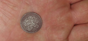 První mince 