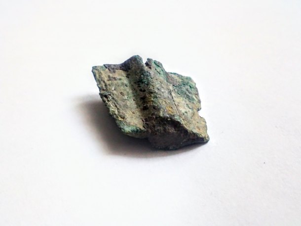 Fragment bronzového hrotu