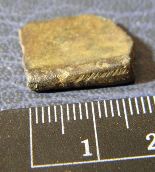 Zdobený fragment (bronz)