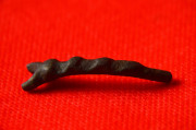 Bronzový fragment.