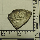 Fragment stříbrné mince