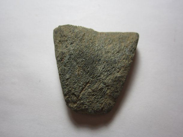 Fragment kamenné sekery