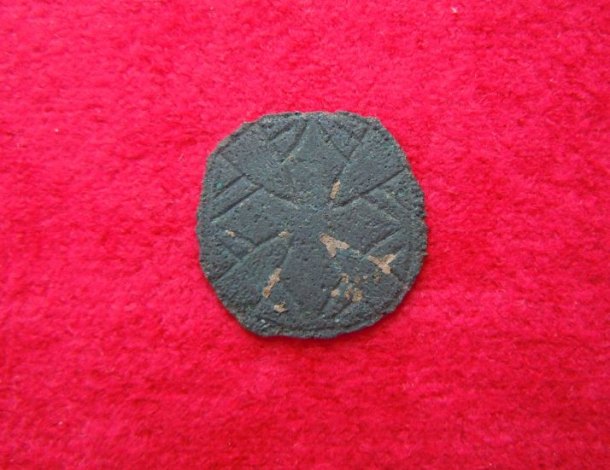 Zdobený kruhový bronzový terčík z opasku