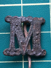 Odznak písmeno M
