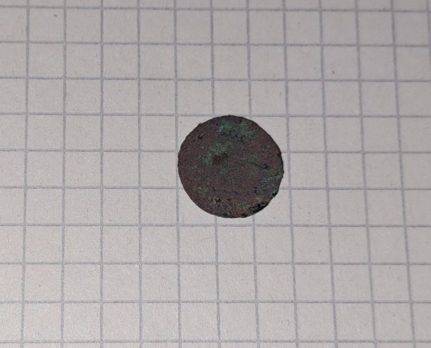 Postříbřená mince s kosočtvercem