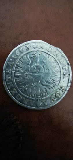 První stříbrná mince