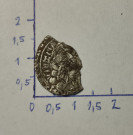 Půlka stříbrné (asi) mince