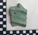 Fragment bronzového srpu