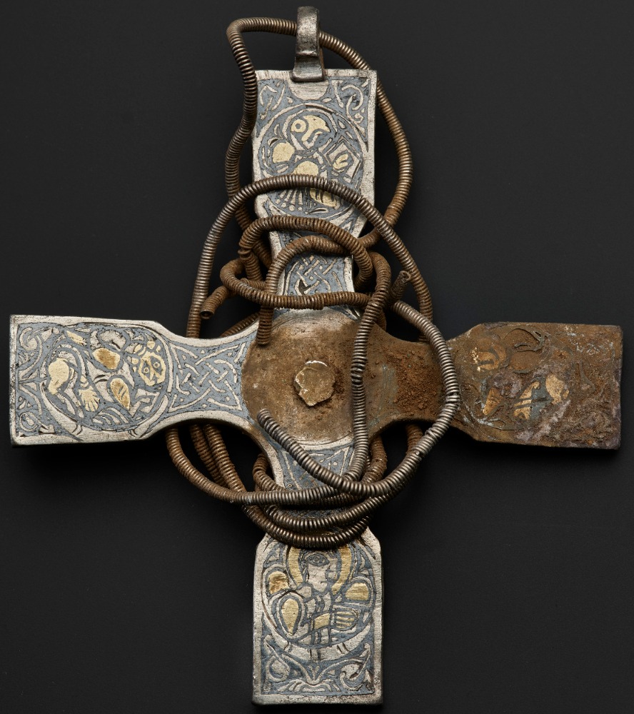 The unique Anglo-Saxon cross from the detectorist's hoard has regained its original appearance after three years of cleaning